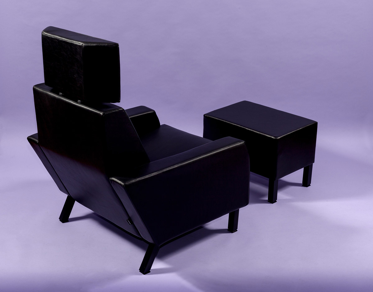 Men's Secrects Men's Secrects massive black leather armchair and tabouret